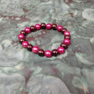 magenta and black bracelet